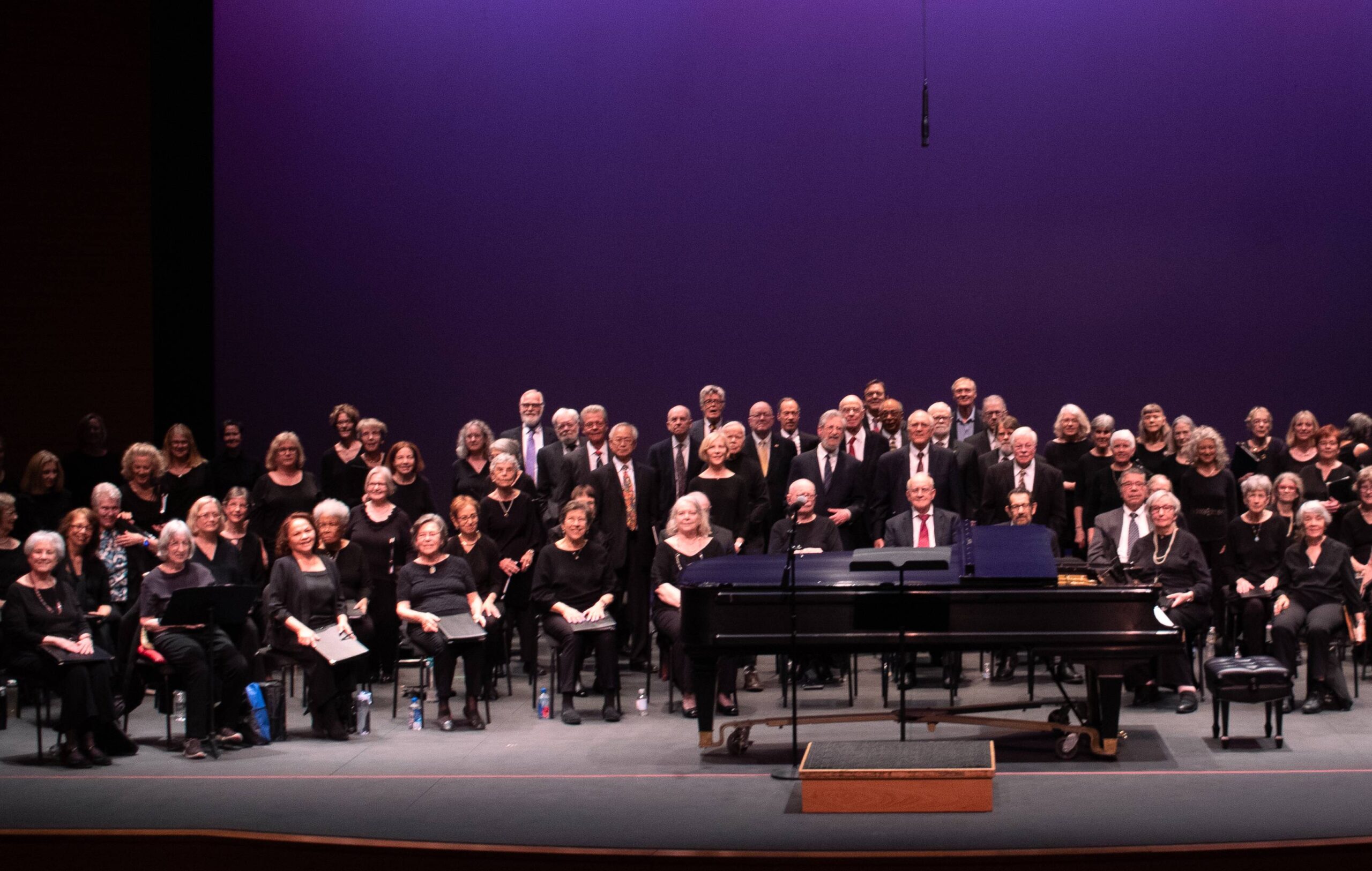 The Encore Chorales of Glen Echo, Schweinhaut, and Rockville pose before their performance in spring 2024.